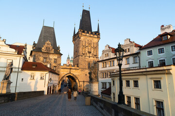 Fototapeta premium charles Bridge in Prague Czech Republic at sunrise with historic statues