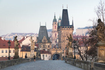 Fototapeta premium charles Bridge in Prague Czech Republic at sunrise with historic statues
