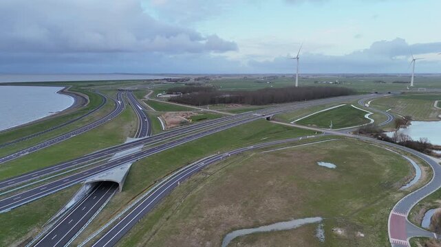 Drone approach to highway interchange before the dam