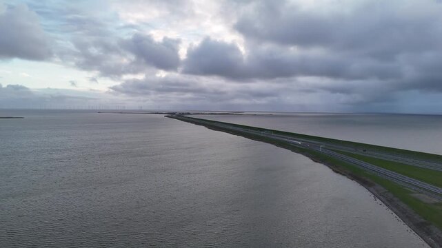 Aerial evening view of Afsluitdijk approach from above