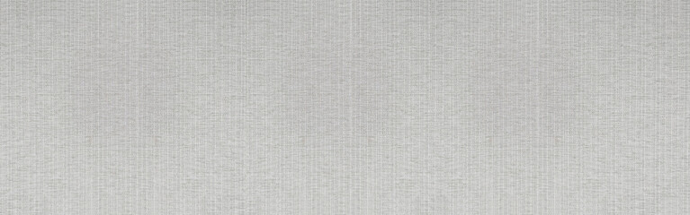 Fototapeta premium Wide panoramic gray fabric texture with fine linen weave and subtle vertical patterns. This high-resolution textile background is ideal for elegant interior design and website banners
