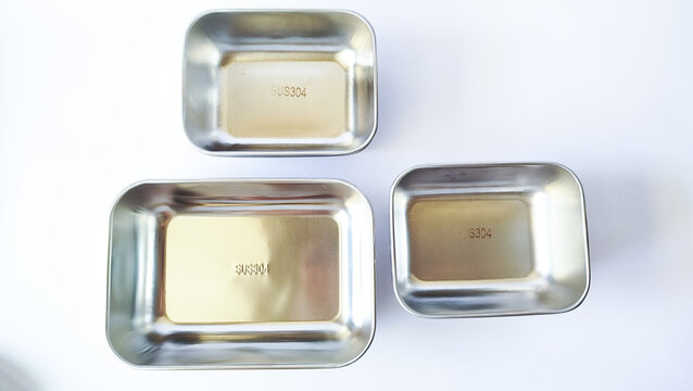 Various size of rectangular stainless steel food containers SUS 304 isolated on white background 