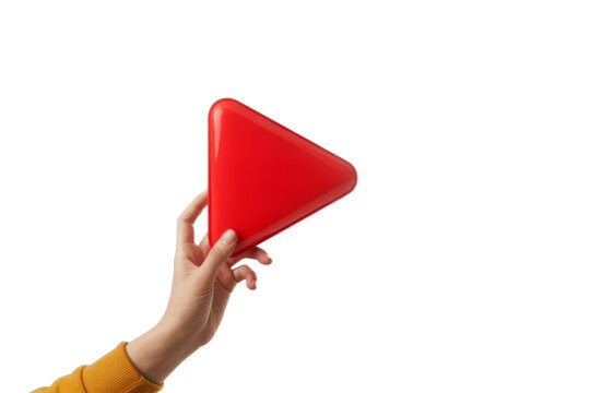 red play button held in hand, isolated on background.