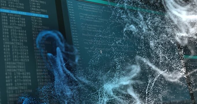 Animated particle field drifting from left, billowing and revealing tech code across dual monitors