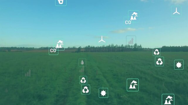 Drone advancing over farmland, causing floating wind, chart, sun, CO icons mapping analytics