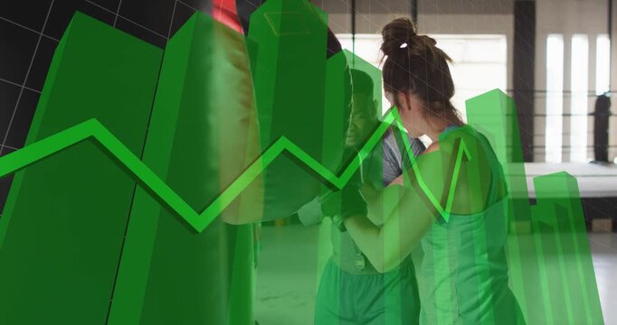 Coach training trainee at boxing bag while coach stepping in, fixing form, green 3D graph sweeping