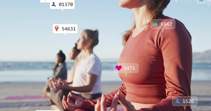Wellness group meditating on sand, camera panning sparking rising social icons showing distraction