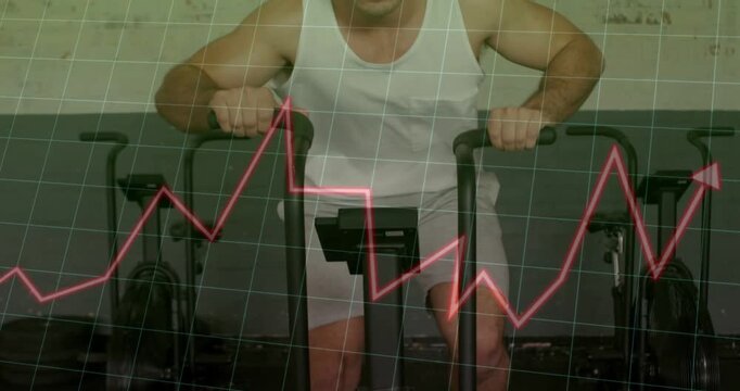 Adult man pedaling bike in gym, pedaling activating grid and pink graph tracking effort across body