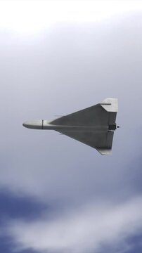 Vertical Video Looking Up at Shahed 136 Kamikaze Drone on Blue Sky Cloud Background. Close-up detailed 3d. UAV Unmanned Aerial Vehicle. Modern Technology Warfare in the Air. Combat Aircraft.