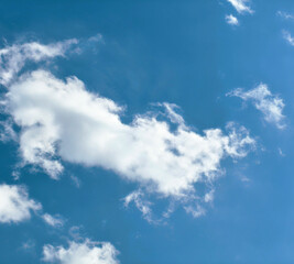 Obraz premium Beautiful Blue Sky with Fluffy White Clouds