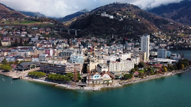 Aerial view of the cityscape of Montreux, Switzerland, with buildings, mountains, and the lake creating a stunning scene, Montreux, Vaud, Switzerland.