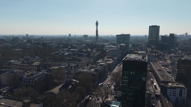London city skyline silhouetted Panning drone aerial viewed from Kings Cross