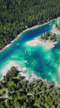 Caumasee Lake Cauma stunning turquoise alpine region in Flims, Switzerland vertical video