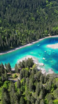 Lake Cauma Caumasee stunning turquoise alpine lake located in Flims, Switzerland vertical video