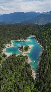 Lake Cauma Caumasee in Flims, Switzerland Swiss Grisons canton aerial drone vertical video reel