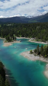 Caumasee Lake Cauma in Flims, Switzerland Swiss Grisons canton aerial drone vertical video reel