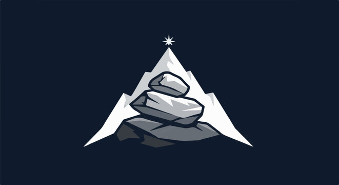 Stacked stones on a mountain peak with a star