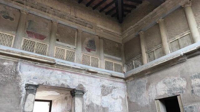 Herculaneum excavations with ancient frescoes, mosaics, and decorations in Roman villas preserved by the eruption of Mount Vesuvius, showcasing art and daily life in Italy.