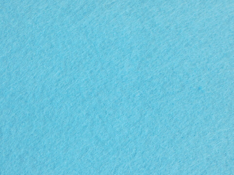 Soft light blue felt fabric texture background
