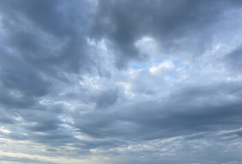 Fototapeta premium Dramatic dark blue cloudy stormy sky with clouds, scenery nature background