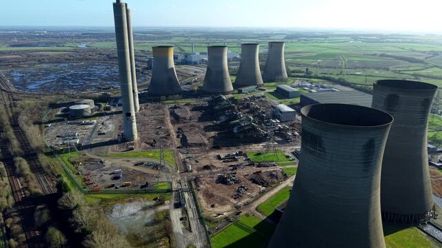 Aerial view of the decommissioned West Burton Power Station revealing contrasting textures and tones, a landscape in Retford, United Kingdom.