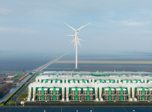 Aerial view of data center and wind turbine at Middelmeer Netherlands