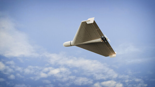 Military drone flying over blue sky bottom perspective UAV flight