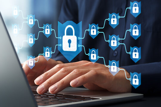 Network security with microsegmentation and access control systems. Firewalls to prevent unauthorized intrusion. Businessman using laptop computer with secure communication software.