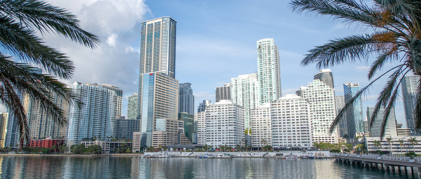 MIAMI, FL - MARCH 31, 2018: Modern buildings in Downtown from Brickell Key. Miami attracts 20 million tourists annually