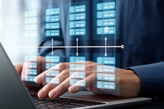 Accessing servers in data center. Cloud storage network. Businessman using laptop computer for server monitoring.