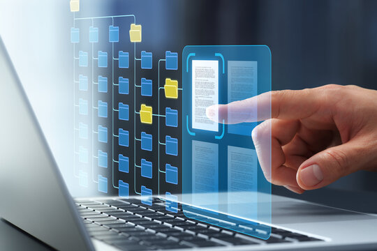 Document and knowledge management system. Searching for business information in files and folders. Businessman tapping digital document on laptop keyboard.