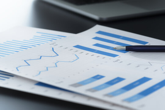 Business reports and financial data analysis. Documents with graphs and charts for business planning and decision making.