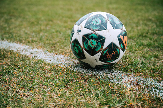 PARIS, FRANCE, MARCH 31, 2026: Official UEFA Champions League football placed on green pitch, ready for match action