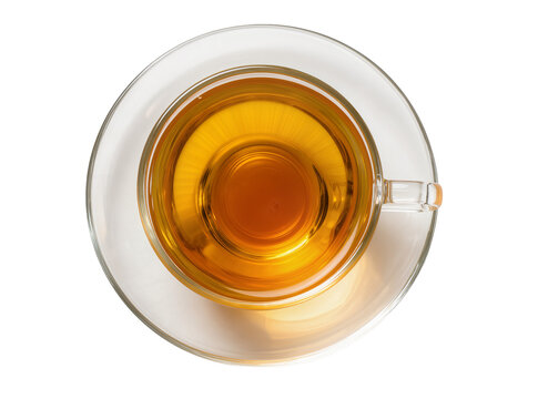 Overhead view of a transparent glass teacup filled with golden amber tea, resting on a matching saucer, isolated PNG, ideal for beverage menus and design projects