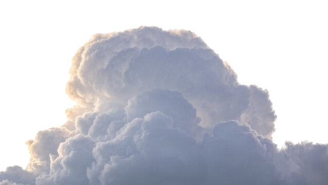 Isolated impressive large fluffy cloud with glowing golden edges and deep blue shadows