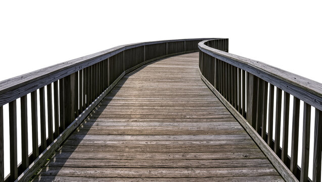 Isolated rustic wooden boardwalk with handrails for walking, leading into a curve