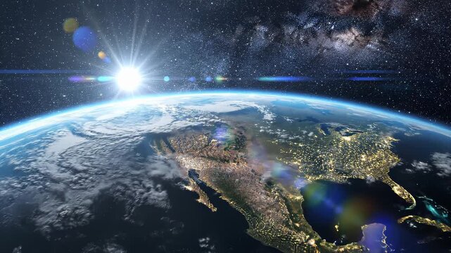 Earth from space sunrise over continents and city lights.