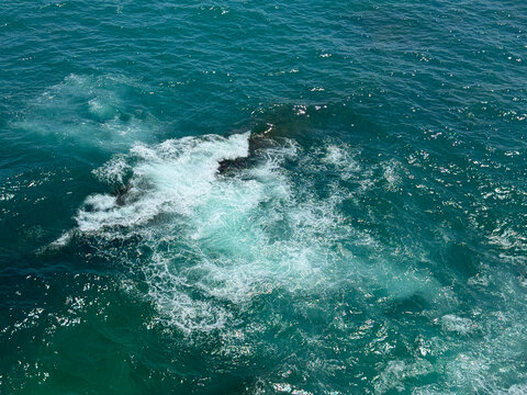 Blue sea waves aerial view.