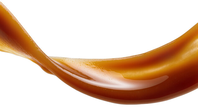 Thick viscous caramel sauce flowing in a smooth wave, isolated on transparent background
