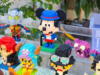 Obraz premium Taiwan, Taipei City, January 3, 2026 – Close-up of LEGO Mickey Mouse Figure Outdoors