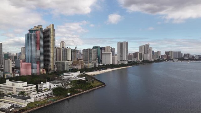 Manila bay dolomite beach aerial view with city skyline