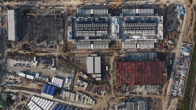 Aerial drone view of a data center under construction in Chonburi, Thailand, showcasing hyperscale AI infrastructure, cloud computing systems, and large scale IT technology development.