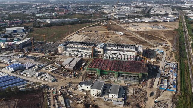 Aerial drone view of a data center under construction in Chonburi, Thailand, showcasing hyperscale AI infrastructure, cloud computing systems, and large scale IT technology development.
