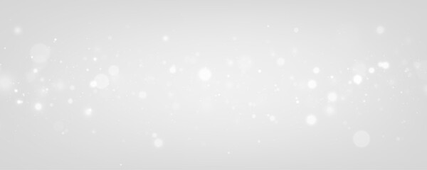 Soft white particles drift over a transparent background, forming delicate glowing bokeh. PNG allows easy use in digital compositions.  © Extrastock