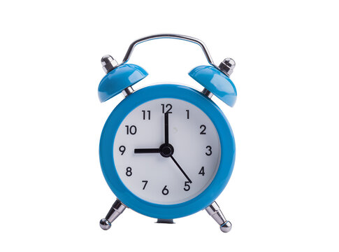 Isolated vintage blue alarm clock with classic design and metal bells set to nine o'clock