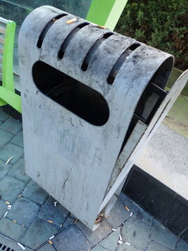 city street rubish bin on a pavement