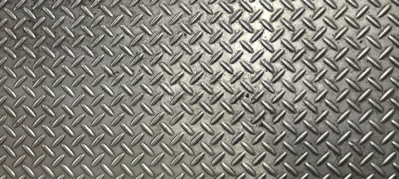 The diamond plate  also known as tread plate or checkered steel plate. which is a type of metal stock with a regular pattern of raised diamonds or lines on one side.