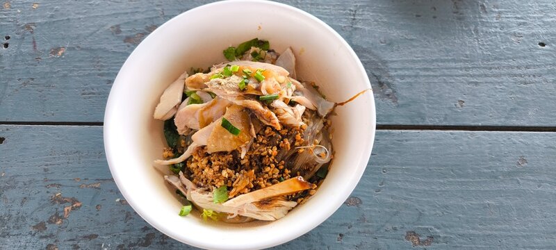 Chicken noodle soup is a Chinese dish sold in Thailand.