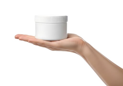 A hand holding a small white jar with a screw-on lid against a plain background