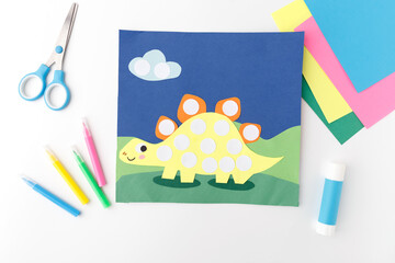 dinosaur paper craft kit kids creative hobby diy project education school art class nursery decor kindergarten preschool learning activity preschooler handmade stegosaurus flat lay colorful tools © Elena